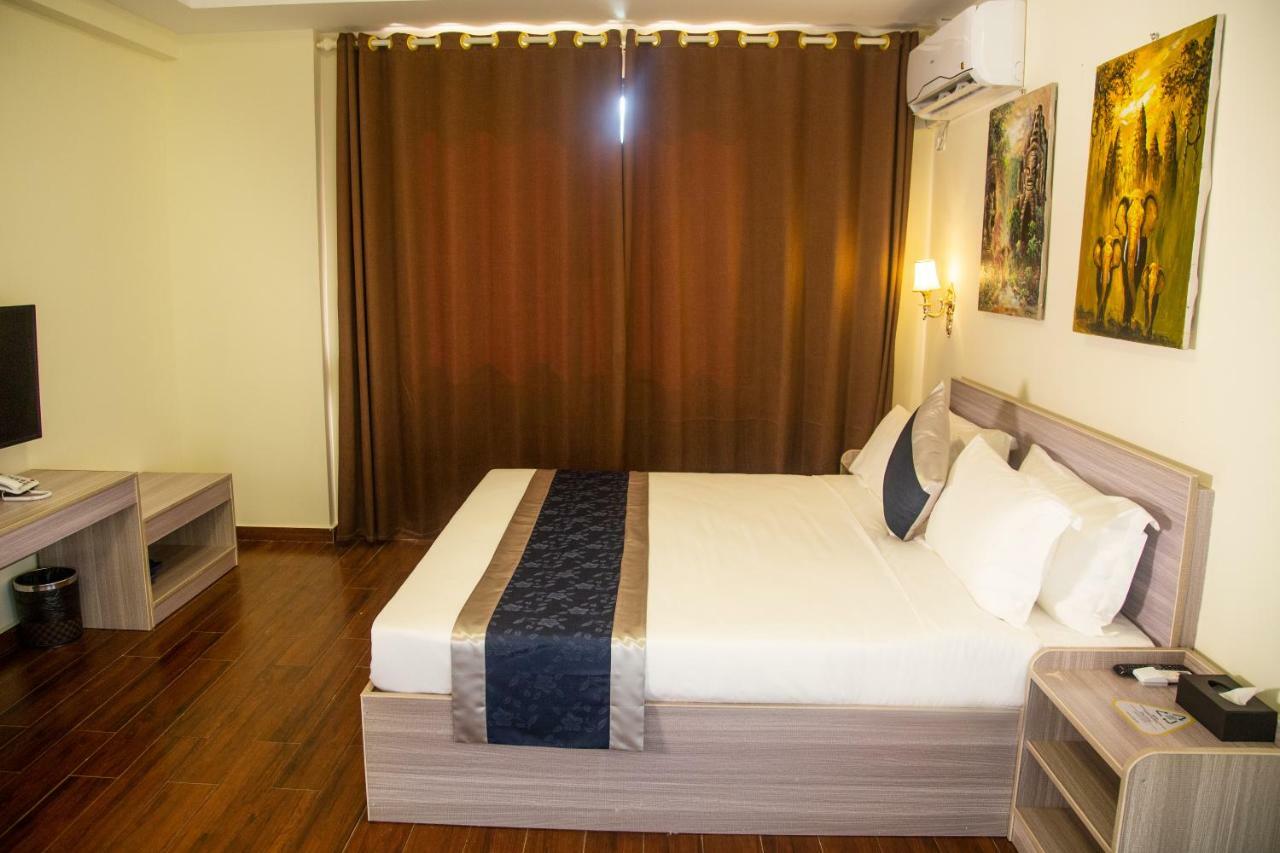 ซิตี้ คอมฟอร์ต โฮเต็ล พนมเปญแอร์พอร์ต Hotel ภายนอก รูปภาพ